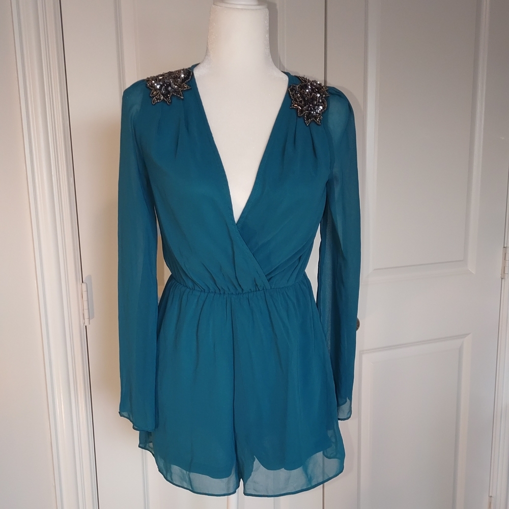 Teal low v-neck romper